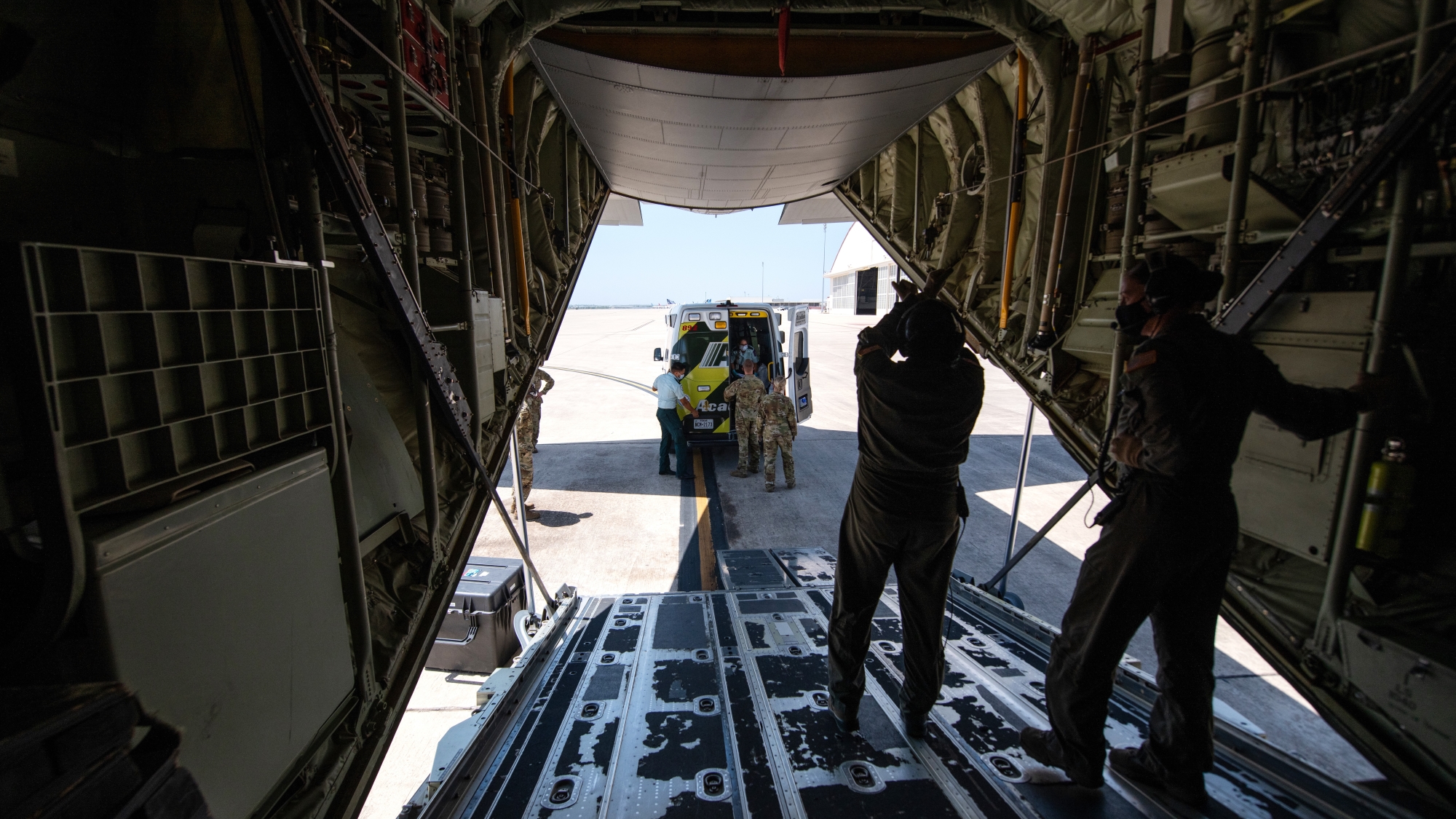 Service men working on an airplane