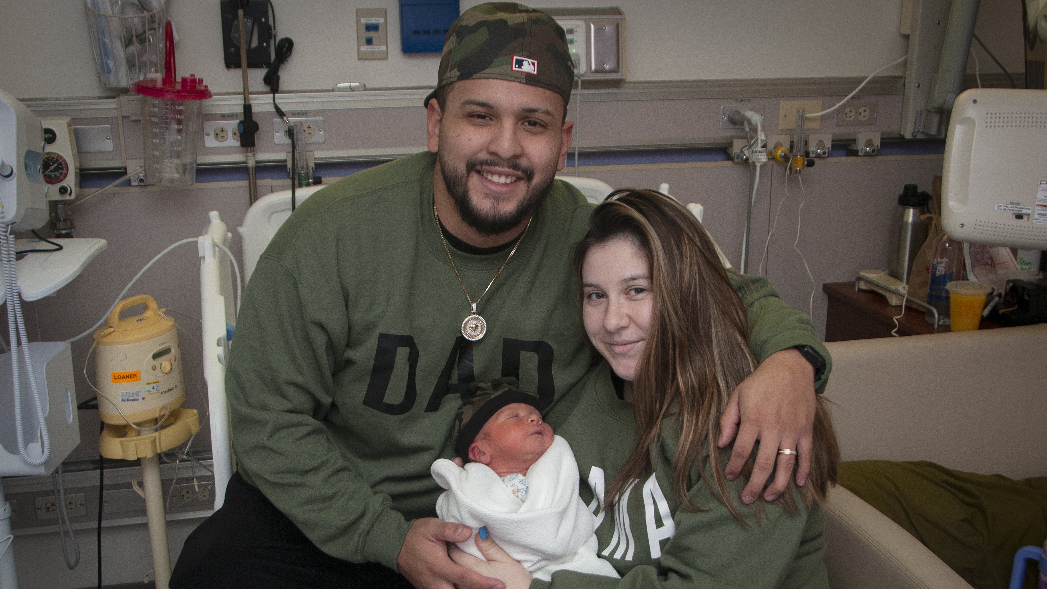 mom and dad with new baby