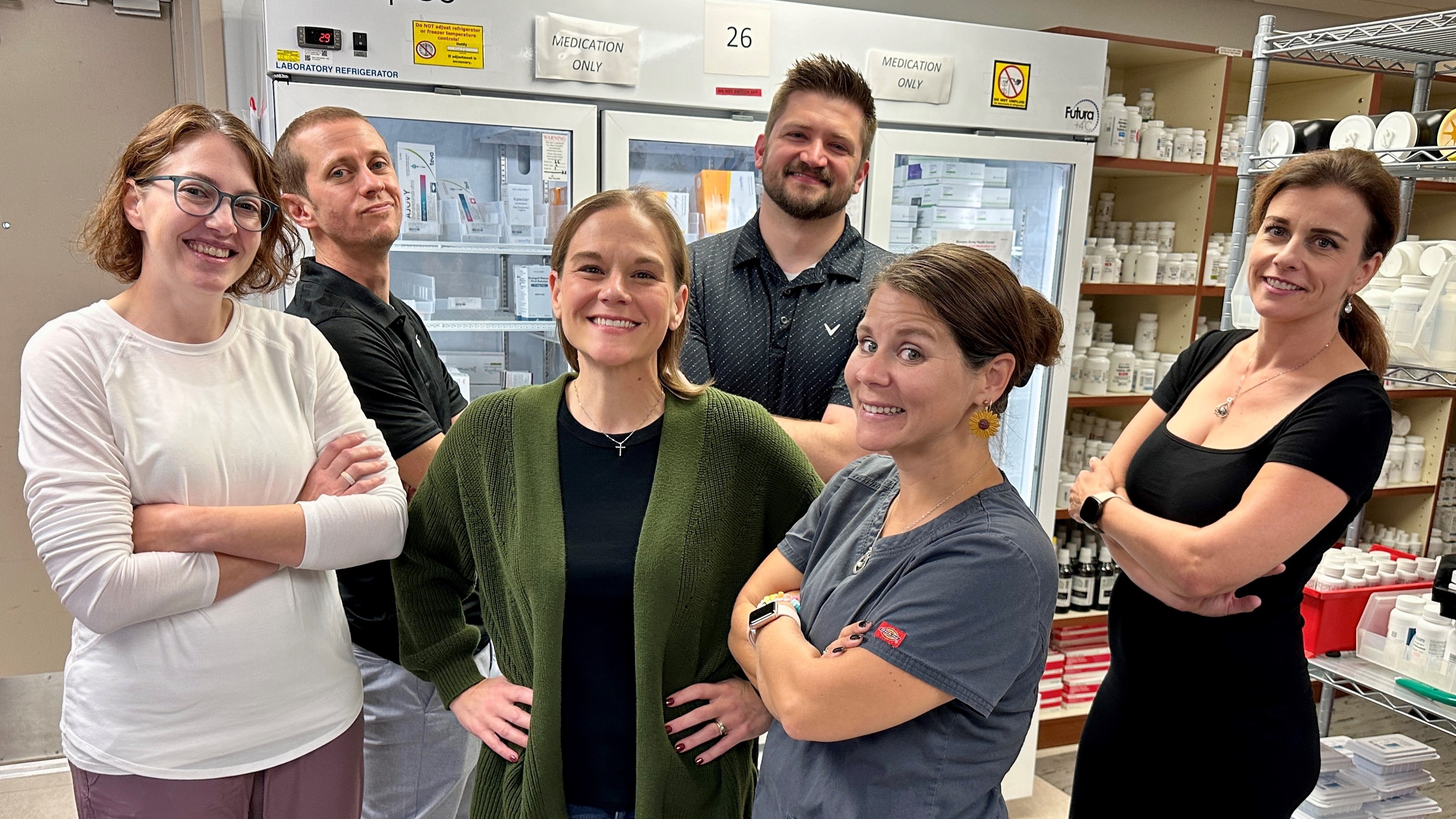 Lab staff looking happy after recognition