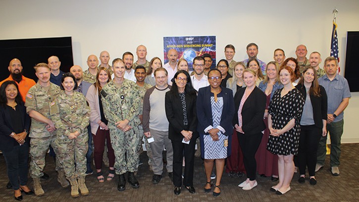 Group of people standing and posing for the camera