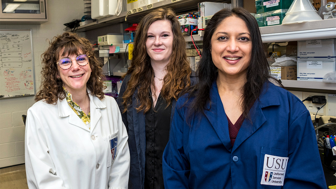USU study co-authors Dr. Elsa Ronzier (left) and Dr. Prasanna Satpute-Krishnan (right), with Neuroscience graduate student Alexandra Graninger, in Dr. Krishnan’s lab at USU.  (Photo by Thomas Balfour)