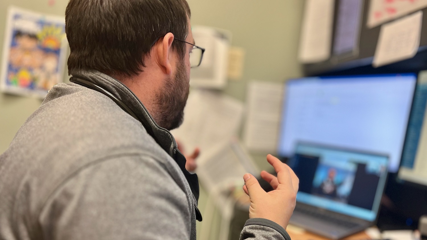 Pediatrics chief Dr. Matthew Fults conducts a scheduled virtual visit with a beneficiary Jan. 10 at Winn Army Community Hospital. The pediatric clinic was the first to go live with My Military Health, a change in culture for both healthcare providers and beneficiaries. Primary care at Winn went live on Feb. 10 "The intent of these changes is to deliver care when patients need it in an efficient and timely manner," Fults said. "This is just the beginning—stay tuned as other clinics embrace this innovative approach to care." (Photo by Gustave Rehnstrom)