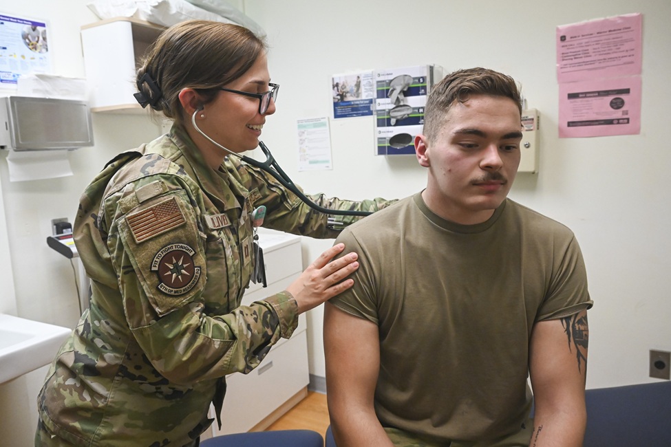 U.S. Air Force Capt. Lauren Olivieri, 8th Operational Medical Readiness Squadron warrior medicine physician, conducts a patient check-up on Senior Airman David Adsit, 8th Logistics Readiness Squadron vehicle maintenance technician, at Kunsan Air Base, Republic of Korea, Feb. 18, 2025.
