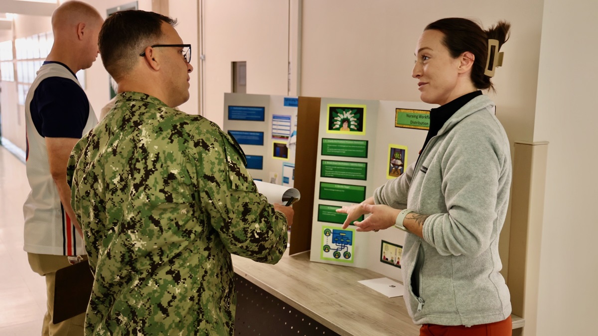 Sailors and staff at Navy Medicine Readiness and Training Command (NMRTC) Twentynine Palms showcase innovative projects aimed at enhancing patient care, streamlining operations, and improving efficiency during the 10th Annual Process Improvement Fair on March 14, 2025. The event highlighted 15 projects across multiple departments, with top honors awarded to initiatives focused on warehouse optimization, medical readiness assessments, and supply management. (U.S. Navy photo by Christopher C. Jones, NHTP/NMRTC Twentynine Palms public affairs officer).