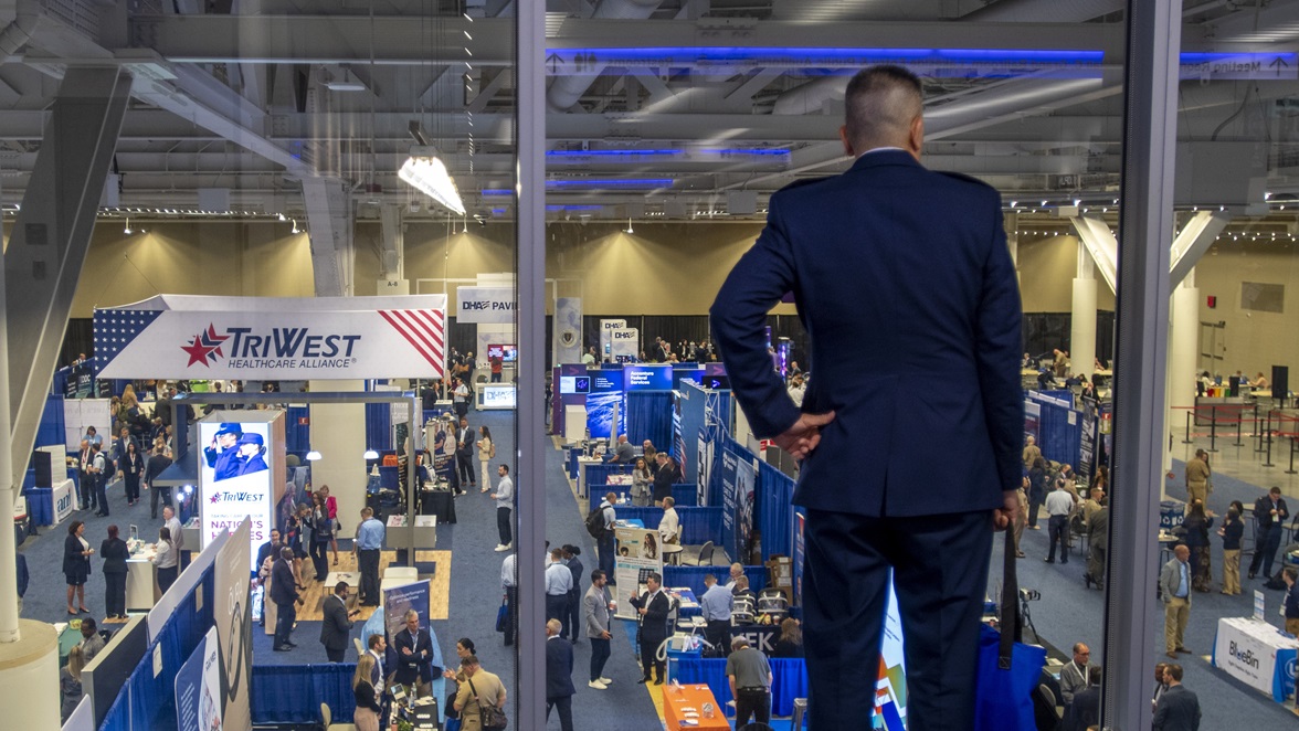 An attendee of the 2025 Military Health System Conference gets a bird’s-eye view of the exhibition hall in Cleveland, Ohio, April 29.