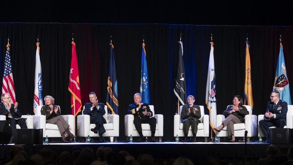 Dr. David Smith, acting principal deputy assistant secretary of defense for health affairs and acting director of Defense Health Agency, moderates a roundtable discussion on the state of the Military Health System on the second day of the 2025 MHS Conference in Cleveland, Ohio, on April 30. Discussion participants included: U.S. Army Lt. Gen. Mary Izaguirre, U.S. Army surgeon general; U.S. Air Force Lt. Gen. John DeGoes, U.S. Air Force and U.S. Space Force surgeon general; U.S. Navy Rear Adm. Darin Via, U.S. Navy surgeon general; U.S. Marine Corps Rear Adm. Pamela Miller, medical officer of the Marine Corps; U.S. Army Maj. Gen. Lisa Hou, director, Office of the Joint Surgeon General, U.S. National Guard Bureau, and U.S. Air Force Brig. Gen. John Andrus, U.S. Joint Staff Surgeon.