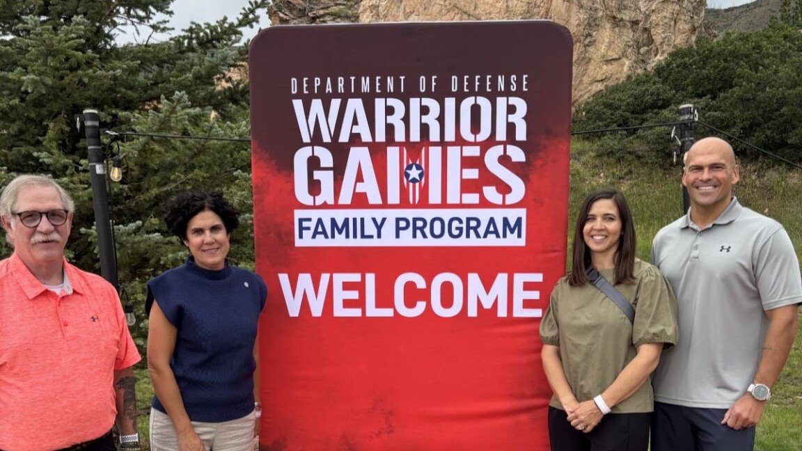 Deputy Director of Warrior Care Recovery Coordination Program Operations Jonathan Morris poses with Deputy Assistant Secretary of War, Health Services Policy and Oversight Ms. Susan Orsega, Director of Warrior Care Recovery Coordination Program Randi Ramcharan, and Policy Director Warrior Care Recovery Coordination Program Tim Rutherford at the 2025 Department of Defense Warrior Games.