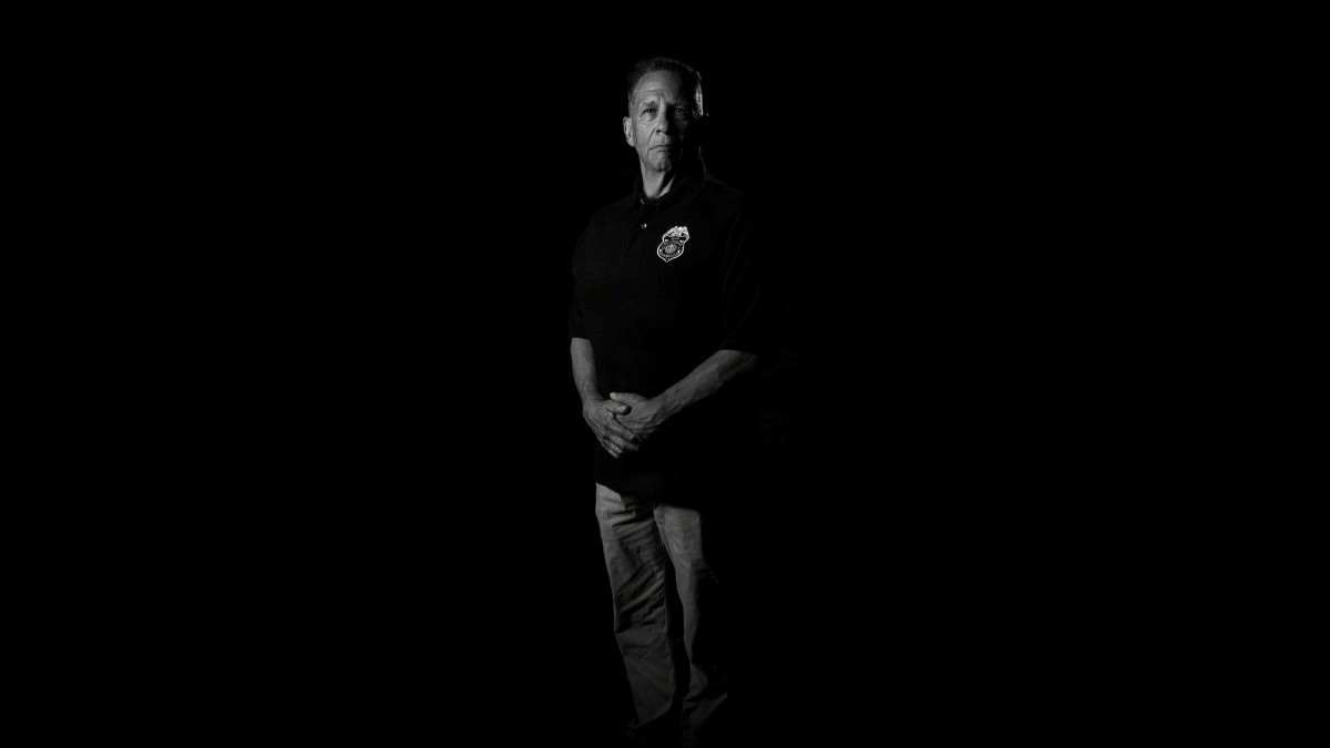 Wayne Hopkins, Armed Forces Medical Examiner System medicolegal death investigator, poses for a photo, Aug. 18, 2026, at Dover Air Force Base, Delaware. Hopkins is one of six MDIs in the federal government’s only medical death investigation system. MDIs are responsible for investigating deaths of service members, civilians, contractors, and dependents associated with the military that occur within exclusive federal jurisdiction. (U.S. Air Force photo by Staff Sgt. Noah D. Coger)