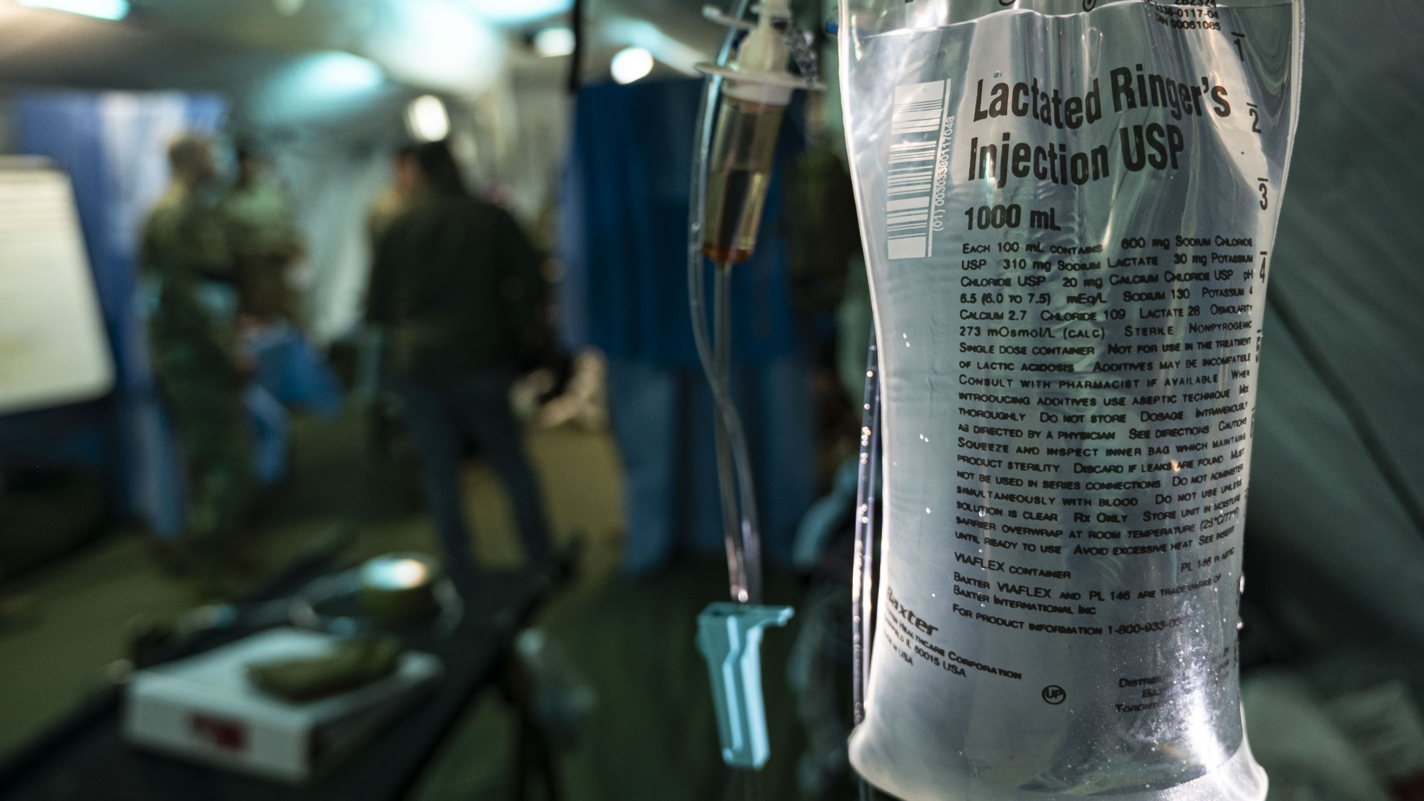 close-up of hanging medicine bag with drip tube
