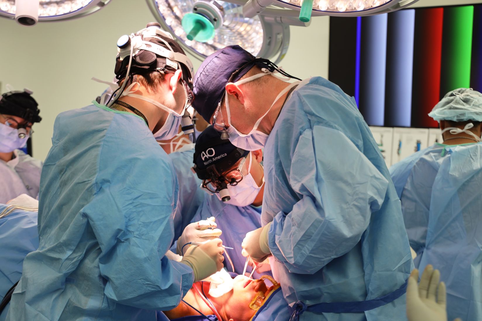 The Maxillofacial Restoration Program surgical team performs a jaw-in-a-day reconstruction procedure at Naval Medical Center San Diego. (DoW photo by Regena Kowitz)