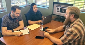 Usability Lab meeting at a desk