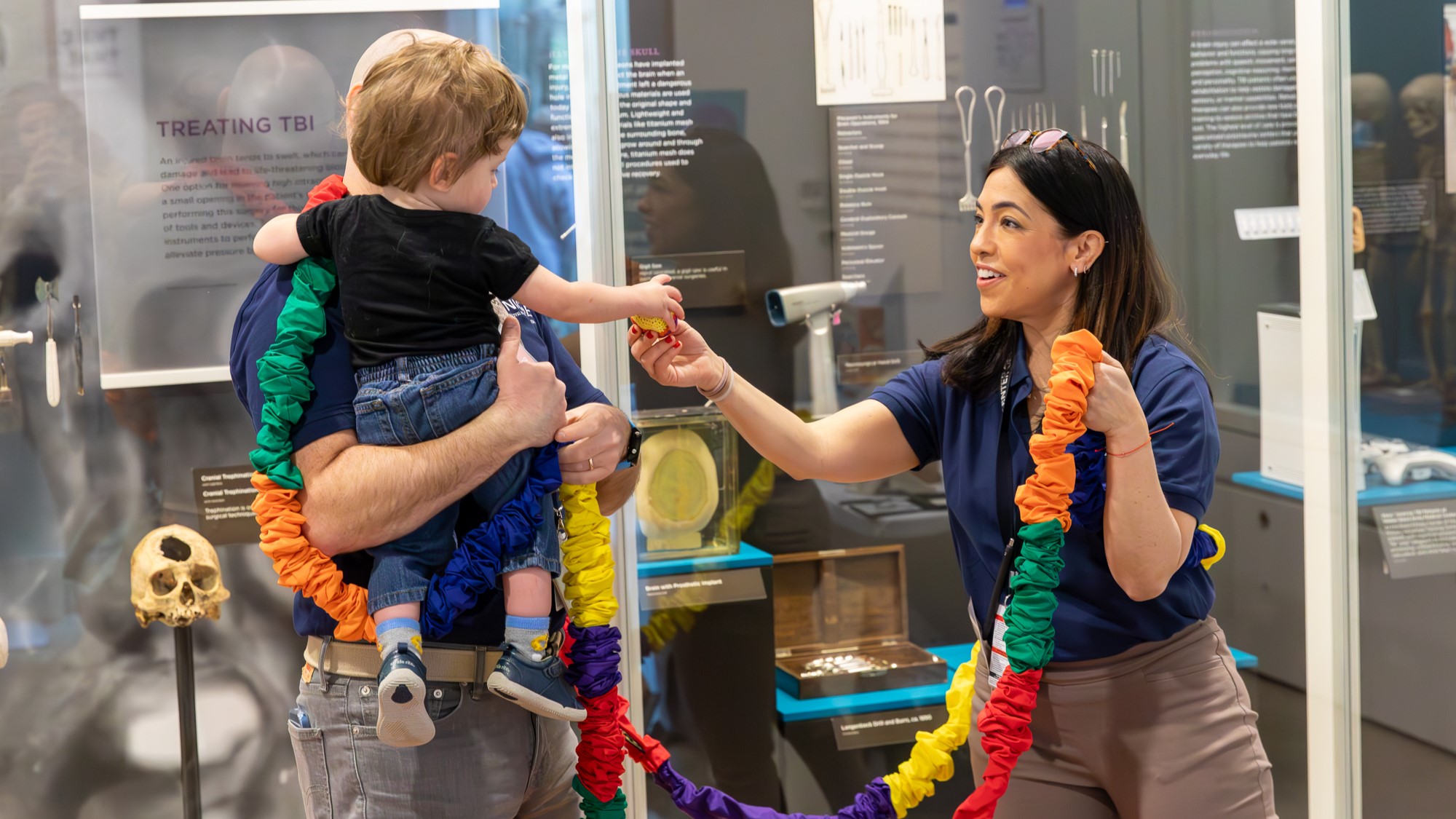 A National Intrepid Center of Excellence staff member demonstrates games and activities